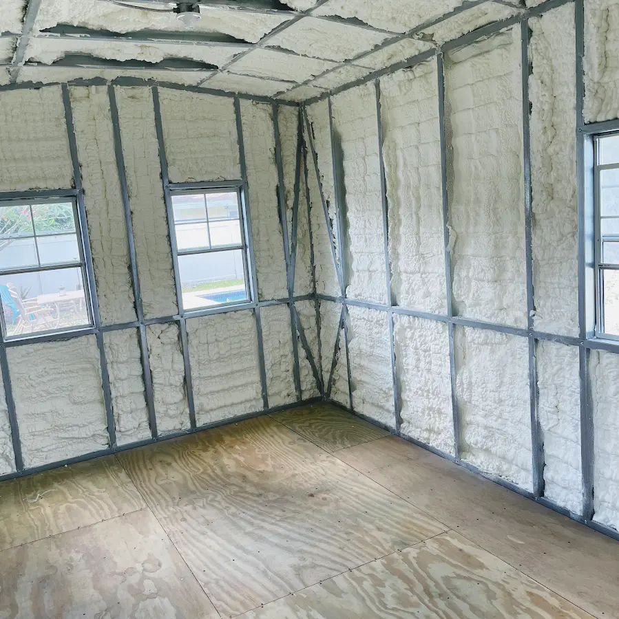 Closed-cell spray foam insulation applied to wall cavities in a residential project in Fort Lauderdale